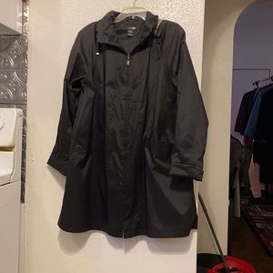 Black long windbreaker.